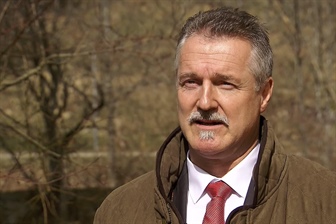 Lovsko poročilo, politični ulov: opomin poslancu zaradi slovenščine